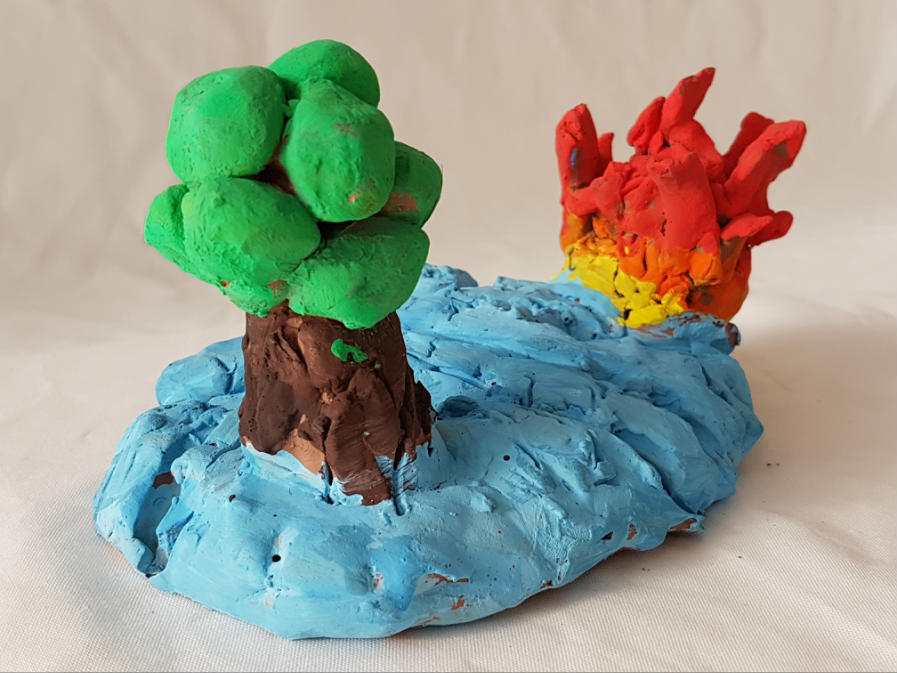 Clay-made tree with a fire