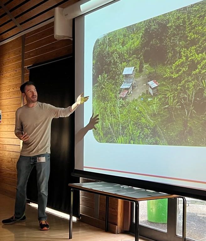 teacher presenting a slideshow on the rainforest